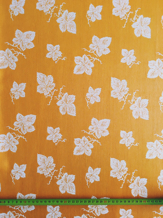 Golden orange ticking with wine leaves. Unused. Spain c.1950 - Per meter (16 m avail.)