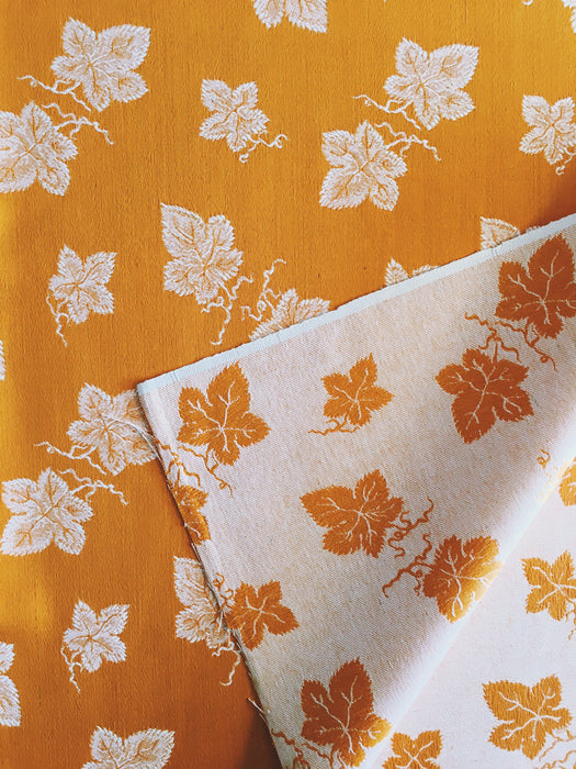 Golden orange ticking with wine leaves. Unused. Spain c.1950 - 0.84 meters