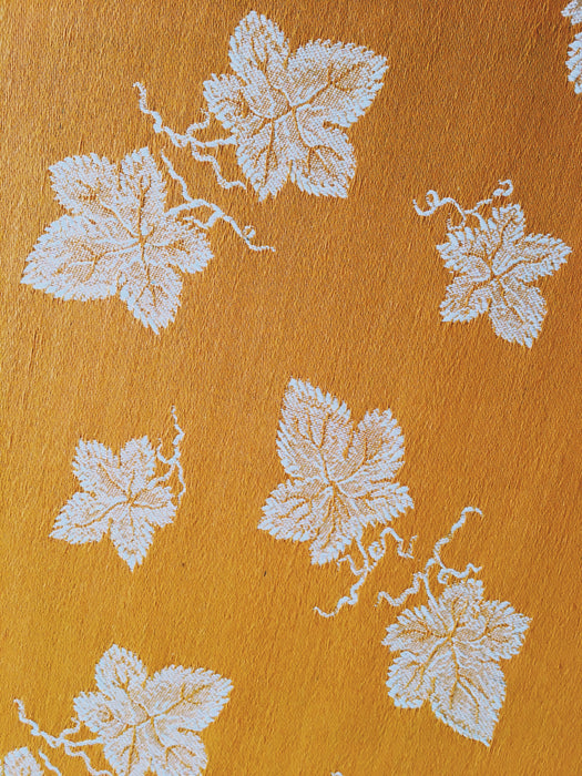Golden orange ticking with wine leaves. Unused. Spain c.1950 - 0.84 meters
