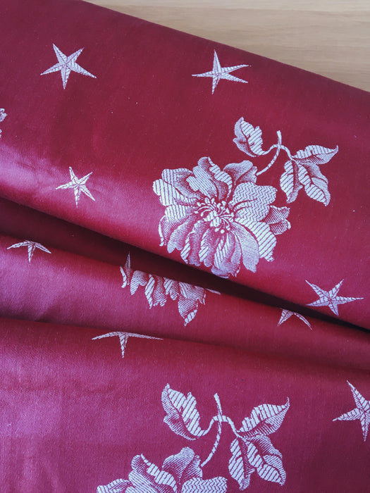 Burgundy ticking with flowers and stars. Unused. Spain c.1950 - 4 meters
