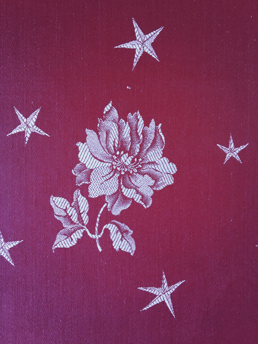 Burgundy ticking with flowers and stars. Unused. Spain c.1950 - 4 meters