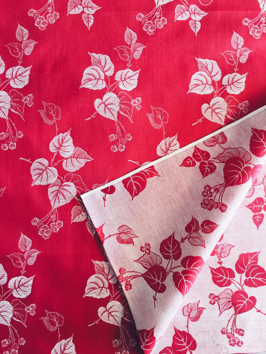 Red ticking with a leaves motif. Unused. Spain c.1950 - 1.87 meters