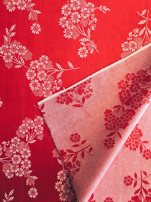 Delicious red ticking with floral motif. Unused. Spain c.1950 - 1.18 meters
