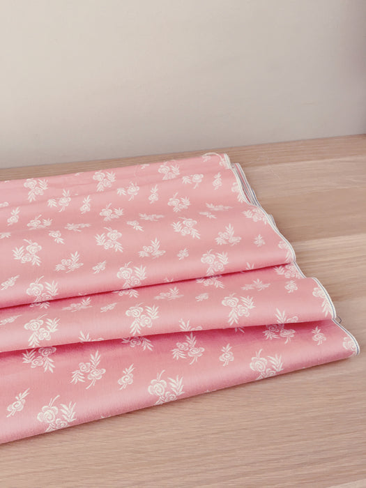 Pale pink ticking with small floral pattern. Unused. Spain c.1950 - 2.5 meters