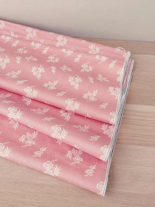 Pale pink ticking with small floral pattern. Unused. Spain c.1950 - 2.5 meters