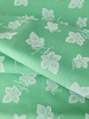 Vine leaves mint green ticking. Unused. Spain c.1950 - Per meter (21 m avail.)