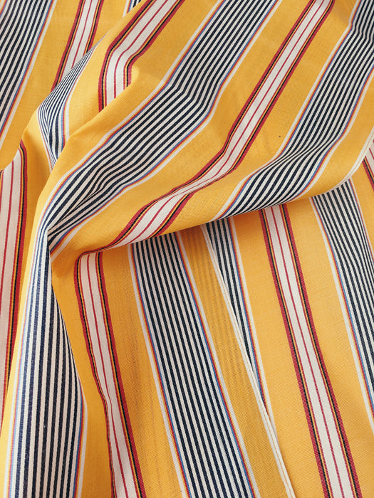Striped ticking in vibrant yellow and red. Unused. Spain c.1950 - 2.75 meters
