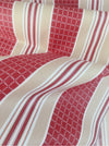 Stripes and checks in strong red and beige. Unused. Spain around 1950 - Per meter (26 m avail.)