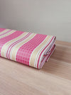 Stripes and checks in magenta pink and beige. Unused. Spain around 1950 - 1 meter