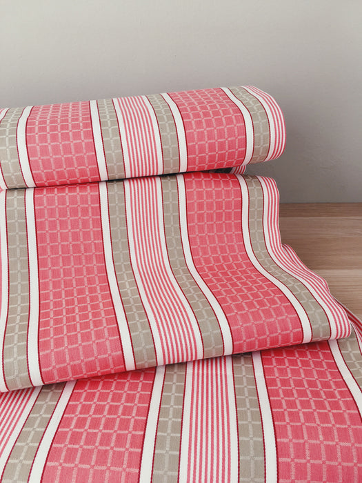 Stripes and checks in cherry pink and beige. Unused. Spain around 1950 - 8.4 meters