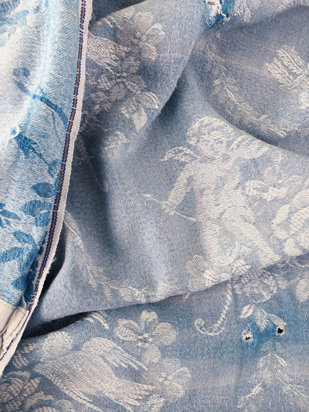 Blue ticking with cute cupids. Spain c.1920 - 76×113 cm