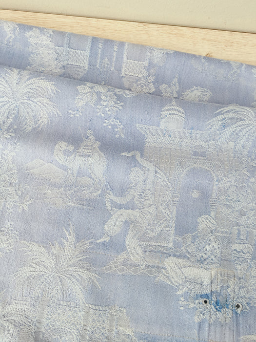 Blue faded ticking with dancer, buildings and soldiers on horseback. Spain c.1950 - 50×135 cm
