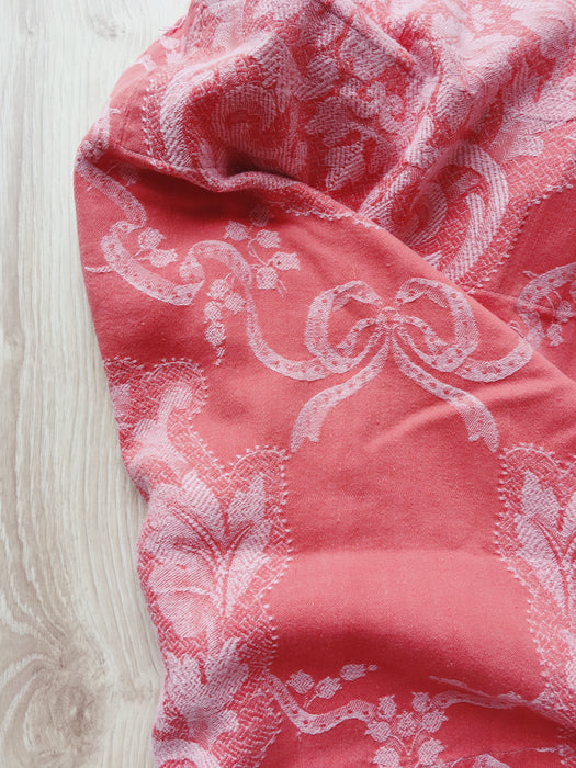 Reddish pink ticking with bouquets and ribbons. Spain c.1930 - 142×148 cm