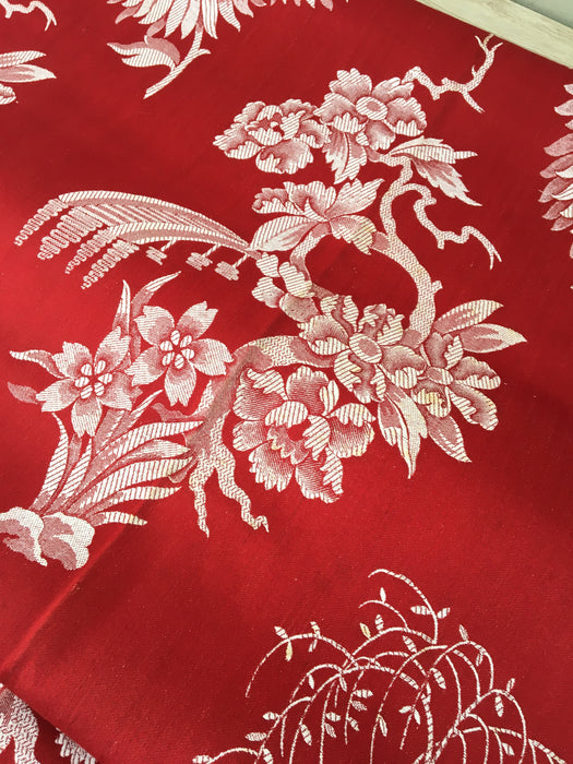 Red chinoiserie ticking with chrysanthemums and maybe mount Fuji. Spain c.1900 - 160 cm × 4.4 meters