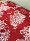 Red chinoiserie ticking with chrysanthemums and maybe mount Fuji. Spain c.1900 - 160 cm × 4.4 meters