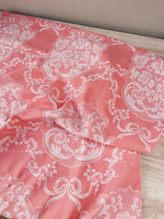 Pink ticking with garlands and ribbons. Spain c.1930 - 72×116 cm