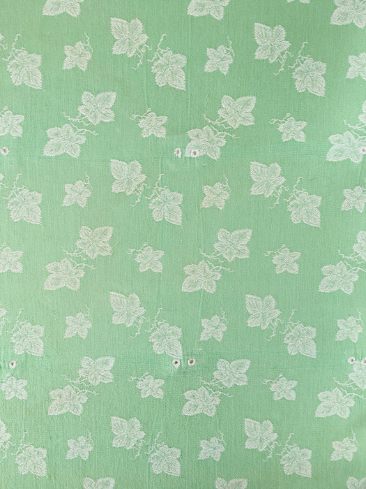 Green ticking with vine leaves. Spain c.1940 - 48×80 cm