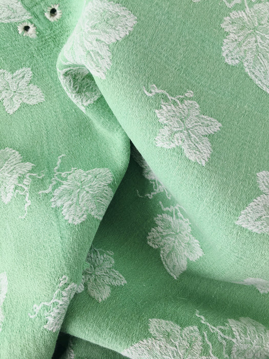 Green ticking with vine leaves. Spain c.1940 - 48×80 cm
