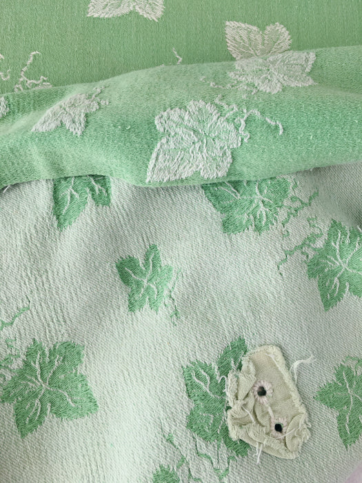 Green ticking with vine leaves. Spain c.1940 - 48×80 cm