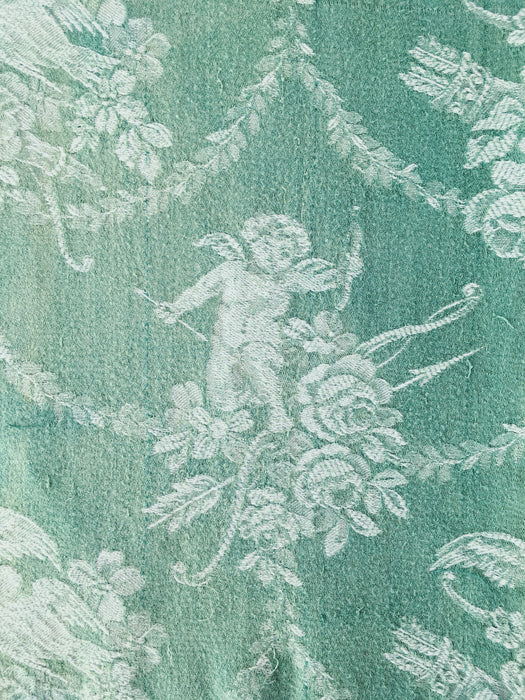 Green ticking with cupids. Spain c.1920 - 30×160 cm