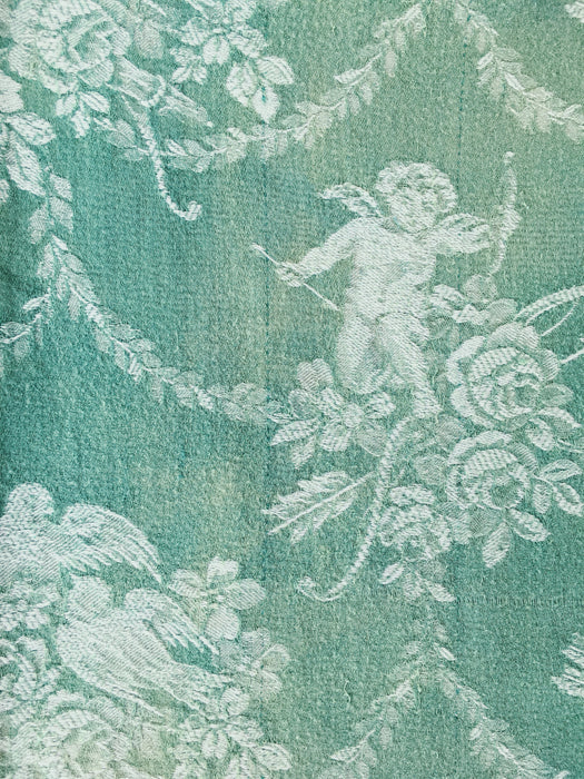 Green ticking with cupids. Spain c.1920 - 30×160 cm