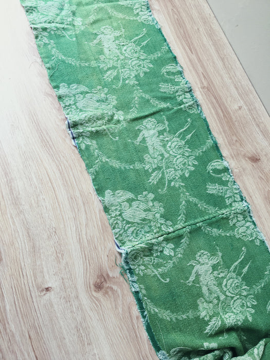 Green ticking with cupids. Spain c.1920 - 30×160 cm
