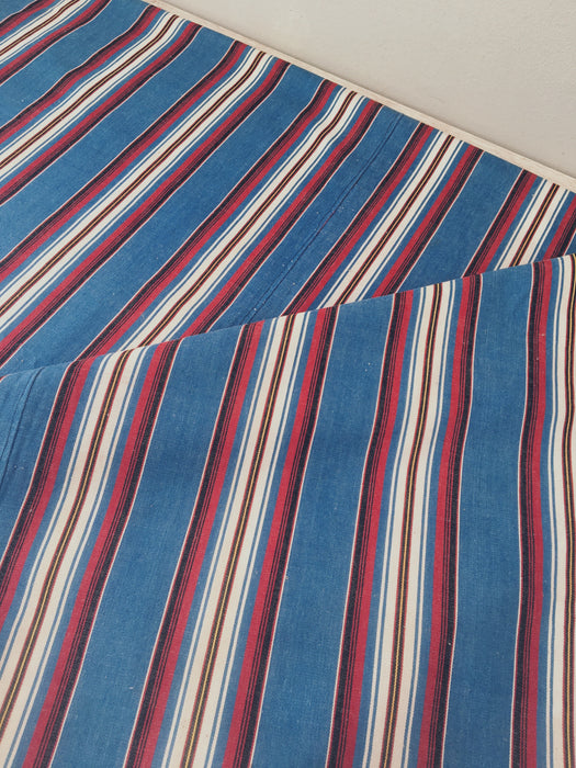 Cover in multicolored blue, red, and white stripes. Finland c.1900 - 114×188 cm 