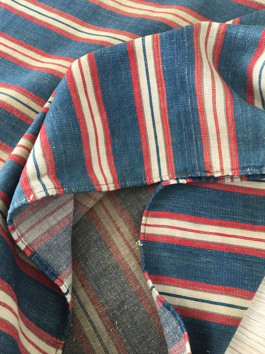 Cover in multicolor striped ticking blue, red, white. A treasure. Finland c.1900