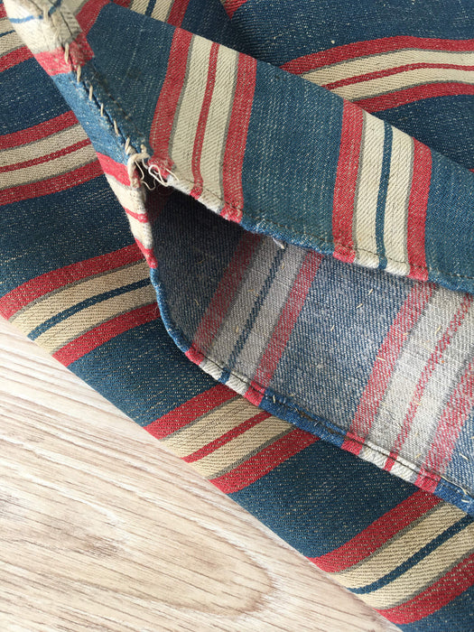 Cover in multicolor striped ticking blue, red, white. A treasure. Finland c.1900