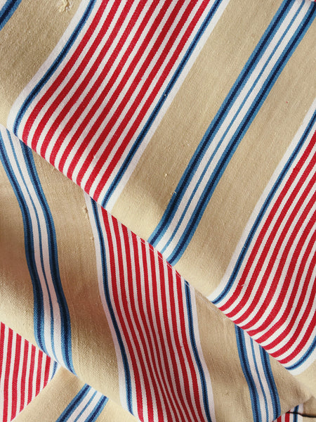 Ticking in beige, blue and red stripes. Spain c.1950 - 80×146 cm