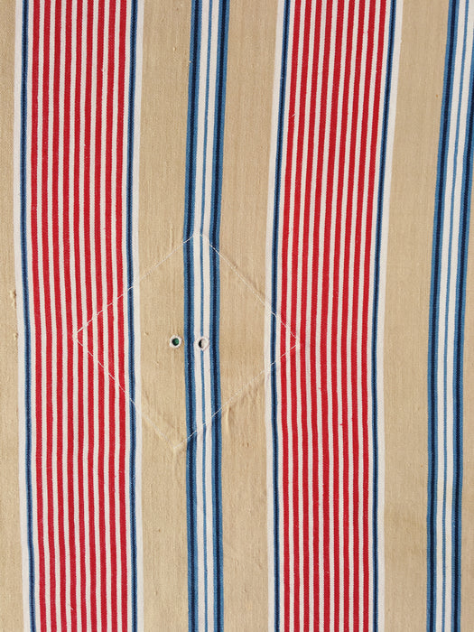 Ticking in beige, blue and red stripes. Spain c.1950 - 80×146 cm
