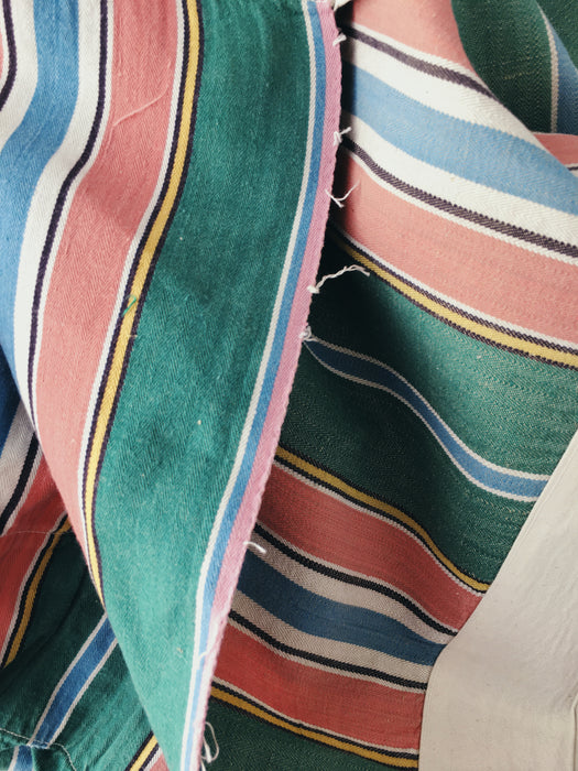 Colorful ticking in orange, blue and green stripes. Spain c.1940 - 52×158 cm