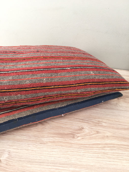 Cushions in wool gray, orange, red stripes. Sweden c.1900