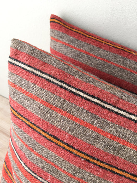 Cushions in wool gray, orange, red stripes. Sweden c.1900