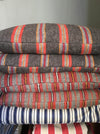 Cushions in wool gray, orange, red stripes. Sweden c.1900