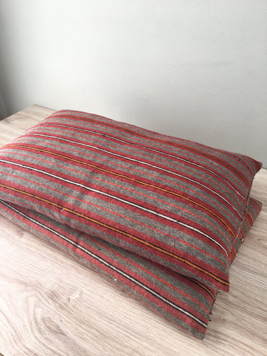 Cushions in wool gray, orange, red stripes. Sweden c.1900