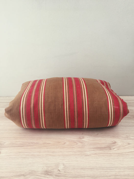 Cushion in brown and red stripes. Sweden c.1900