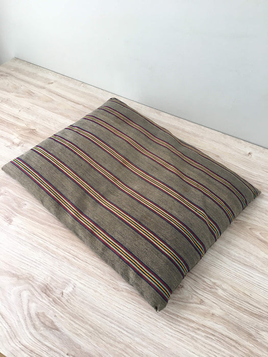 Cushion in stripes gray, brown, red, and yellow. Sweden c.1900