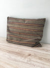 Cushion in stripes gray, brown, red, and yellow. Sweden c.1900