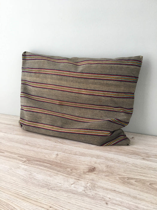 Cushion in stripes gray, brown, red, and yellow. Sweden c.1900
