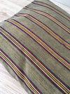 Cushion in stripes gray, brown, red, and yellow. Sweden c.1900