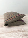 Cushion in stripes gray, brown, red, and yellow. Sweden c.1900