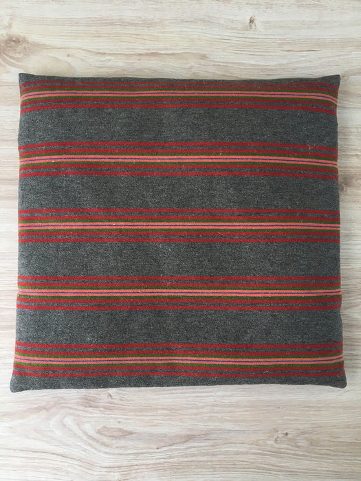 Cushion in pink, brown, and gray stripes. Wool. Sweden c.1900