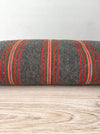 Cushion in pink, brown, and gray stripes. Wool. Sweden c.1900