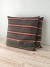 Cushion in pink, green, and gray stripes. Wool. Sweden c.1900
