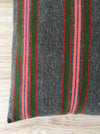 Cushion in pink, green, and gray stripes. Wool. Sweden c.1900