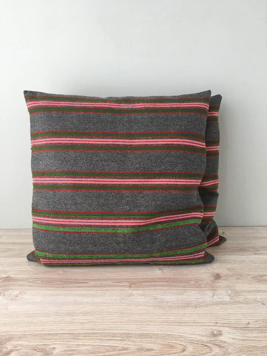 Cushion in pink, green, and gray stripes. Wool. Sweden c.1900