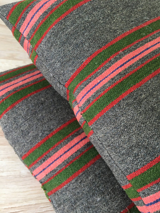 Cushion in pink, green, and gray stripes. Wool. Sweden c.1900