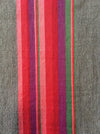 Long panels that were once a Swedish bolster in brown and vibrant warm colors (red, pink, orange, …). c.1900