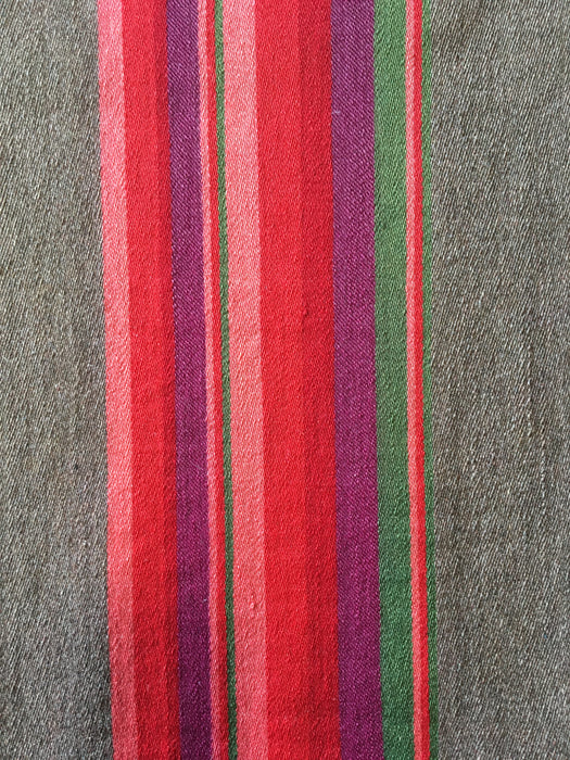 Long panels that were once a Swedish bolster in brown and vibrant warm colors (red, pink, orange, …). c.1900